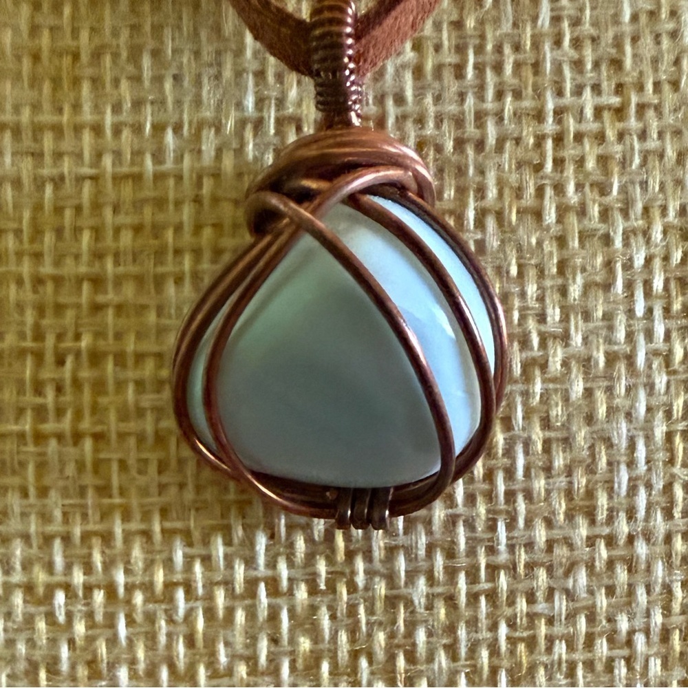 Copper pendant with Larimar stone on a leather cord